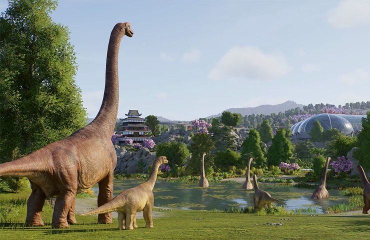 screenshot di jurassic world evolution 3 con brontosauri in un parco