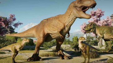 screenshot di Jurassic World Evolution con tirannosauro in primo piano