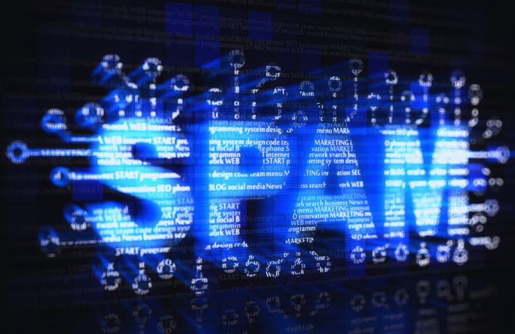 scritta blu SPAM in digitale su sfondo nero