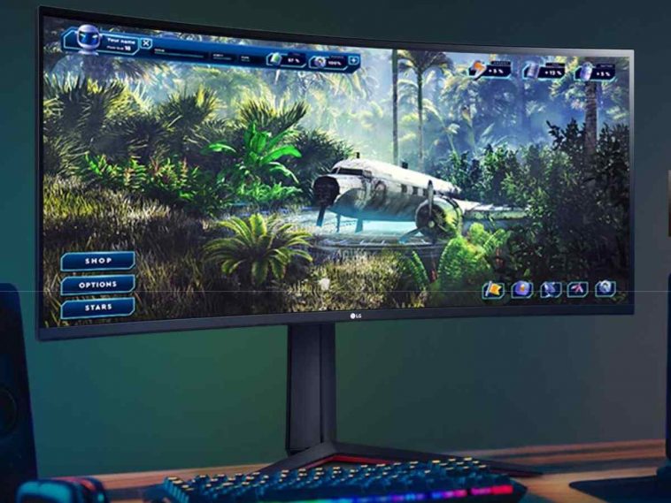 monitor da gaming Ultragear curvo 34" su postazione con casse