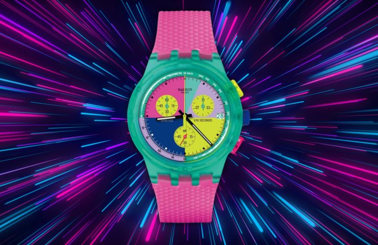 orologio swatch flash arrow su sfondo neon