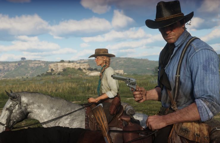 red dead redemption 2 con arthur e altro personaggio femminile a cavallo
