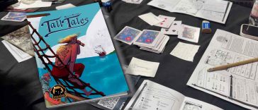 La copertina di Tall Tales con lo sfondo il tavolo di gioco