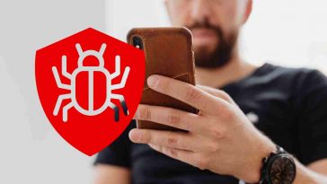 uomo telefono e simbolo malware