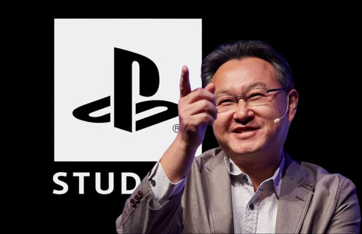 shuhei yoshida in front of playstation studios logo