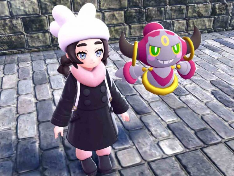 screenshot di DLC Leggende Pokémon Z-A Megadimensione con Anjabelle e Hoopa