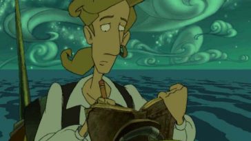 protagonista moneky island ragazzo con capelli biondi e camcia bianca che scrive su diario