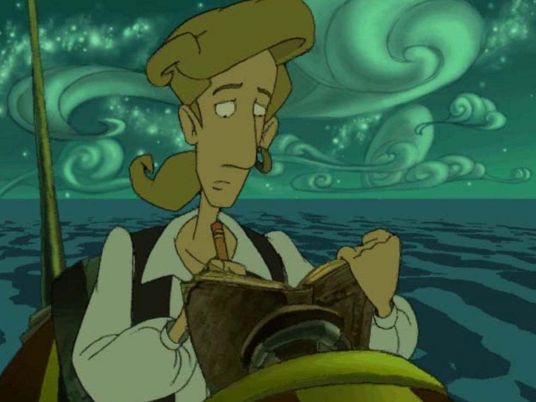 protagonista moneky island ragazzo con capelli biondi e camcia bianca che scrive su diario