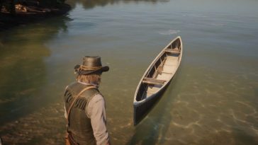 cowboy con coltello che guarda canoa di legno