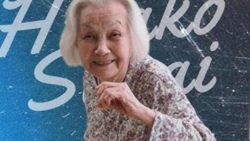 signora anziana giapponese con capelli bianchi in posa di lotta