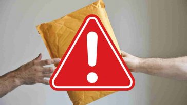 mani e pacchetto con simbolo pericolo